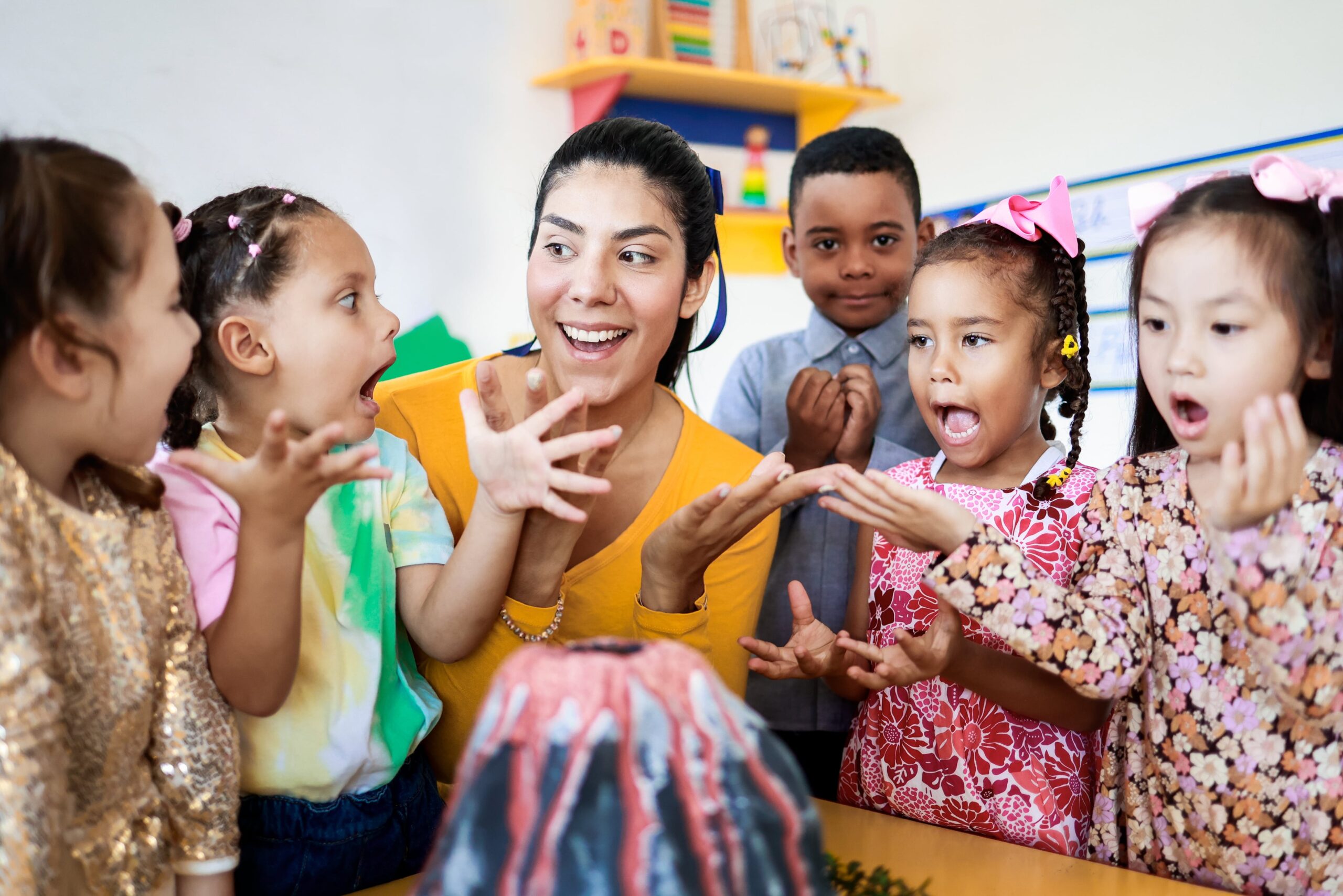 teacher-and-children-learn-about-volcanos-at-scien